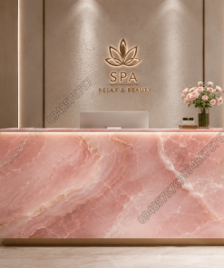 Mặt quầy lễ tân spa được ốp bằng đá Onyx Hồng Pastel gia công vuông vắn